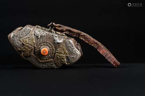 Himalayan Art A silver purse with central coral Tibet, 19th century