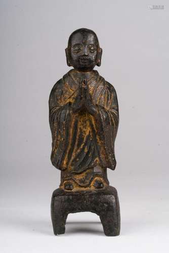 Chinese Art A bronze figure of a standing arhat China, Ming dynasty