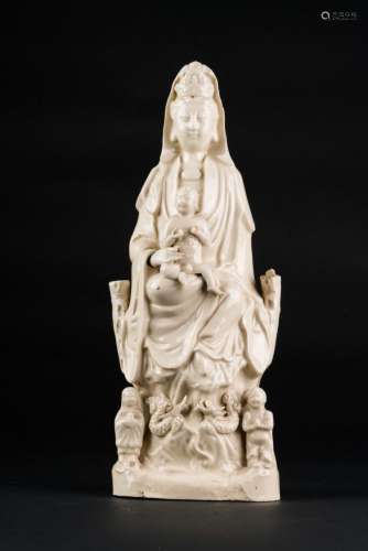 Chinese Art A dehua white porcelain figure of Guanyin with children China, Qing dinasty, 18th century