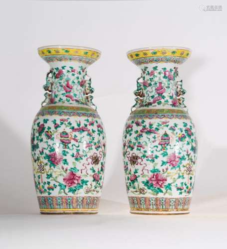 Chinese Art A pair of porcelain vases decoracted with the Buddhist auspicious symbols and peonies China, Republic Period, early 20th century