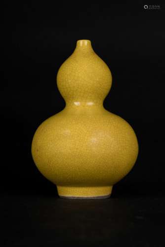 Chinese Art A double pumpkin yellow glazed vase bearing a six character Yongzheng mark within double circle at the base China, Qing dynasty, 19th century