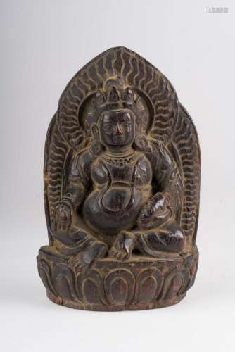 Himalayan Art A Jambhala wooden figure Tibet, 19th century