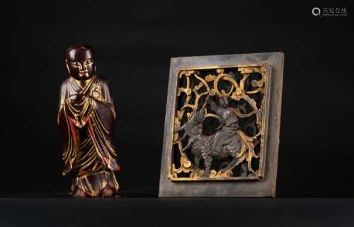 Chinese Art A lot composed two wooden lacquer items: a carved panel and a figure of a standing monk China, Qing dynasty, 19th century