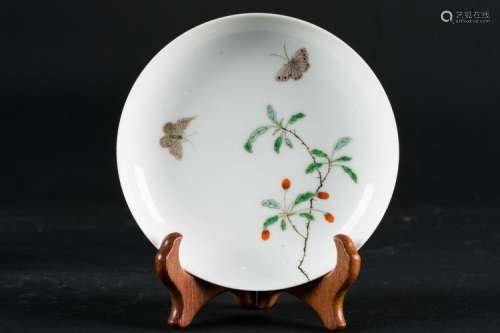 Chinese Art A small dish painted with a branch and butterflies. Yongzheng six character mark within double circle at the base China, 20th century