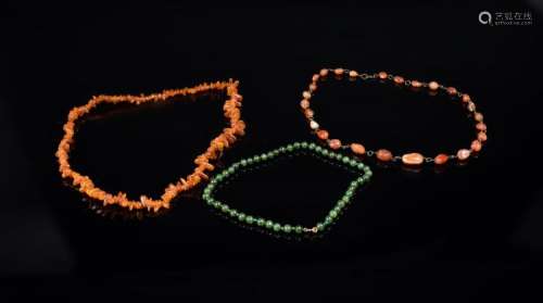 Chinese Art Three necklaces made of amber, jade and carnelian