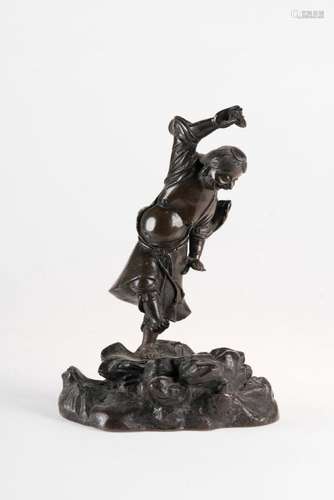 Chinese Art A dark bronze figure of the Daoist immortal Liuhai with the coin on the raised hand China, Ming dinasty