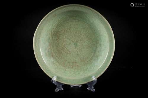 Chinese Art A celadon pottery dish engraved with clouds and abstract motifs China, Ming dynasty