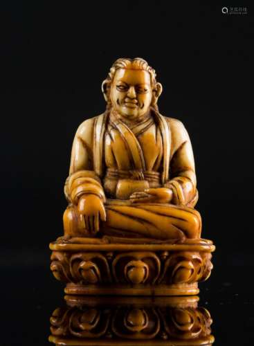 Himalayan Art A small ivory carving portraying Marpa Tibet, 18th-19th century