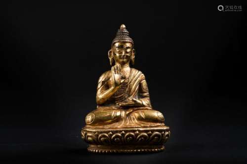 Chinese Art A gilt bronze figure of Amoghasiddhi Sino-Tibet, late 19th - early 20th century