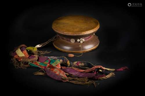 Himalayan Art A large leather and wood damaru drum Tibet, 19th-20th century