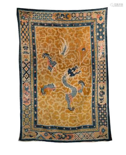 Chinese Art A Ningxia carpet with blue dragon over yellow cloudy ground Northern China, late 18th century