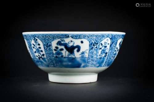 Chinese Art A blue and white porcelain bowl painted with children and flowers and bearing a seal mark at the base China, Qing dynasty, 18th century