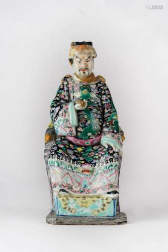 Chinese Art An enamelled porcelain figure of a seated dignitary China, Qing dynasty, 19th century