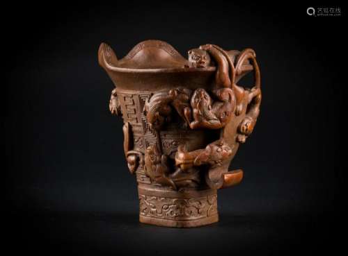 Chinese Art A carved bamboo-root libation cup decorated with archaic motifs and chilongs China, Qing dynasty, 18th century
