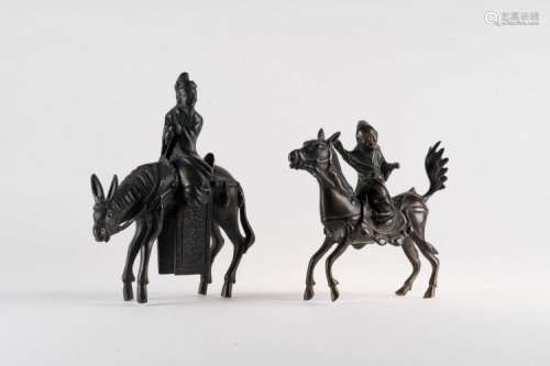 Chinese Art Two cast dark bronze figures depicting characters riding a horse China, Qing dinasty, 19th century