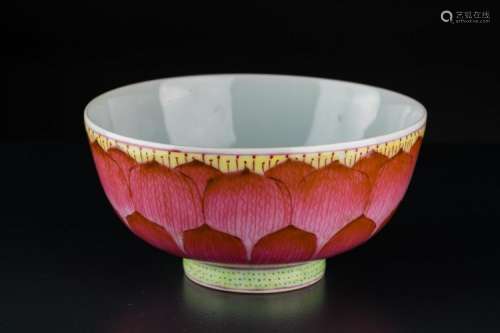 Chinese Art A famille rose porcelain bowl decorated with flower petals and bearing a spurious Qianlong six character seal mark at the base China, 20th century