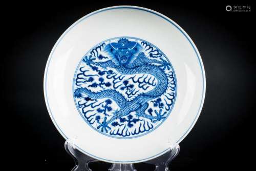 Chinese Art A blue and white dish decorated with dragon and bearing a Guangxu six character mark painted at the base China, 20th century