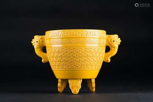 Chinese Art A Chinese tripod yellow glazed porcelain censer bearing a Guangxu six character mark at the base and of the period