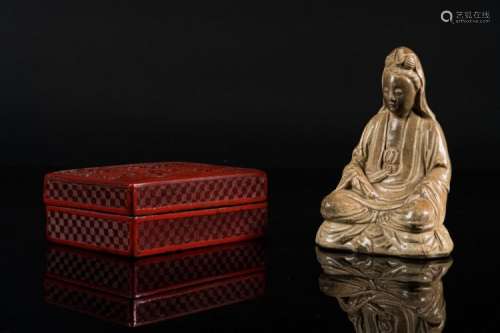 Chinese Art A red lacquered box and cover carved with scholars in landscape and an earthenware seated figure of Guanyin China, Qing dinasty, 19th century