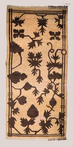 Himalayan Art A Tibetan runner carpet decorated with flowers over cream ground Tibet, 19th century