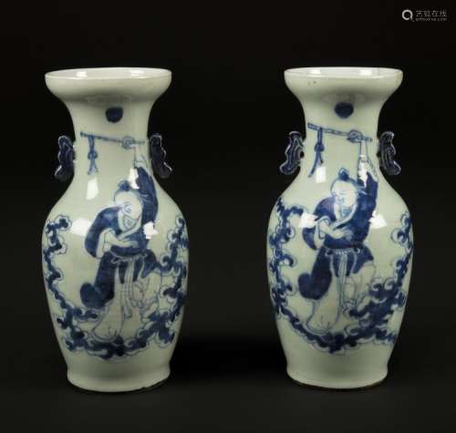 Chinese Art A pair of pottery blue and white vases painted with characters China, 20th century