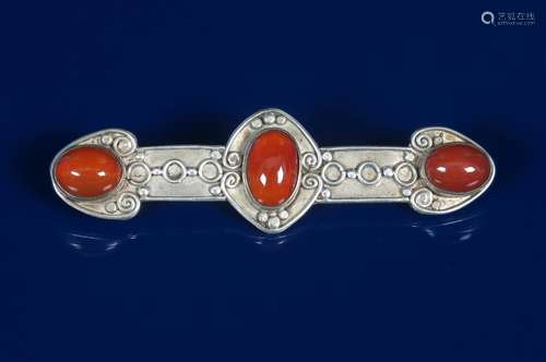 A Celtic Revival silver bar brooch