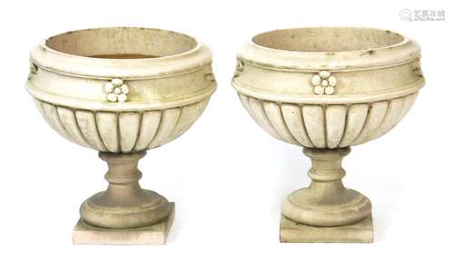 A pair of Leeds Fireclay Lefco Ware low jardiniere and stands