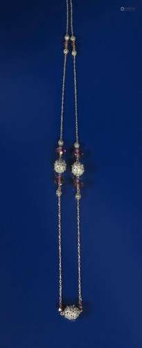 A silver and amethyst glass necklace probably retailed by Liberty & Co