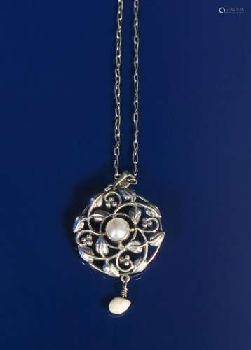 A Liberty & Co silver pendant by William H Haseler