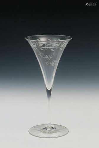 A James Powell & Sons fluted wine glass probably designed by Harry Powell