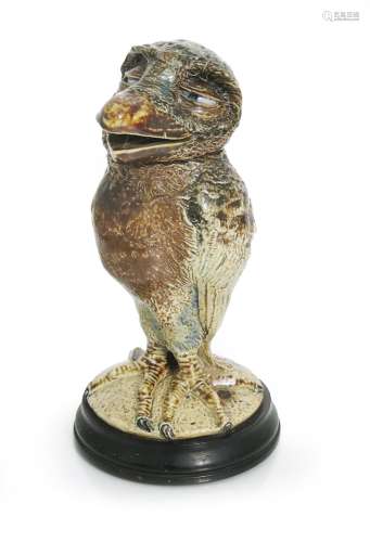 A Martin Brothers stoneware bird jar and cover by Robert Wallace Martin