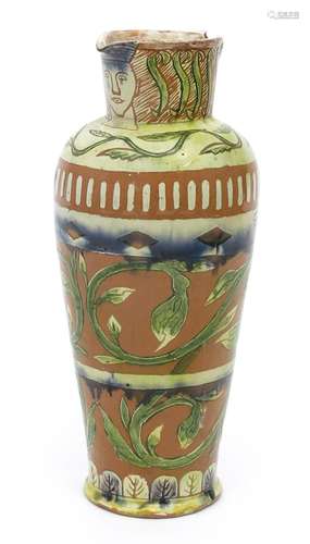 A Della Robbia Pottery jug by Arthur E Bells