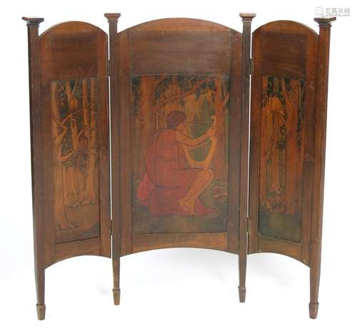 A mahogany three fold fire screen