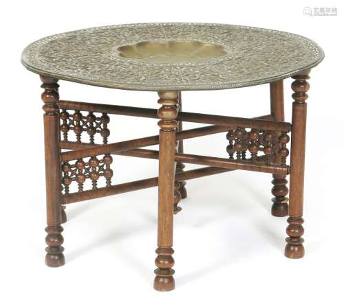 A Jeypore School of Art brass tray topped occasional table