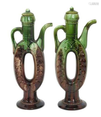 A rare pair of Ault Persian pottery ewer and covers designed by Dr Christopher Dresser