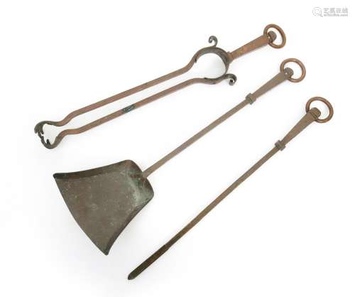 A wrought copper set of fire tools