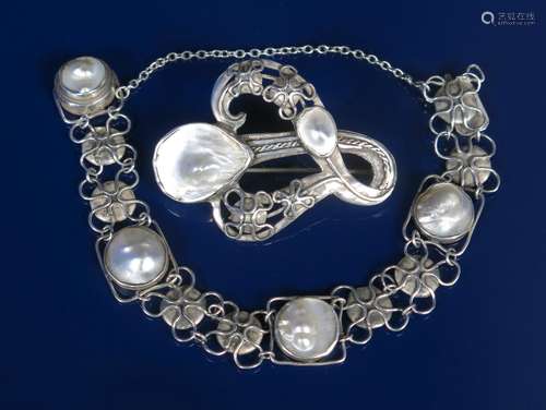 A Celtic silver and blister pearl brooch