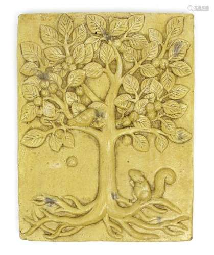 A painted pottery panel in the style of C.F.A. Voysey