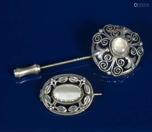 A silver brooch