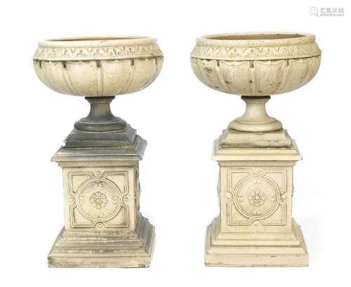 A pair of Leeds Fireclay Lefco Ware jardiniere on stands