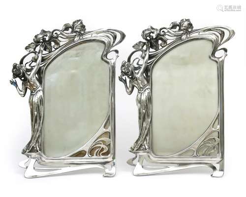 A large pair of Art Nouveau polished pewter photograph frames