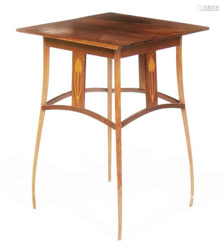 An Art Nouveau inlaid mahogany occasional table