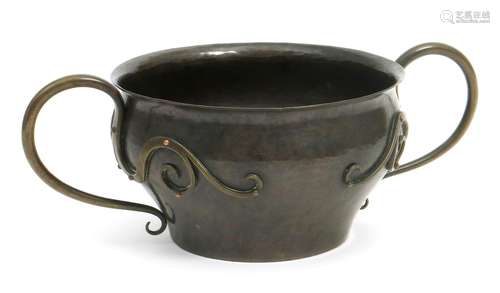 A Birmingham Guild of Handicrafts patinated copper jardiniere designed by Arthur Stansfield Dixon