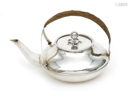 A Liberty & Co Cymric silver teapot and cover