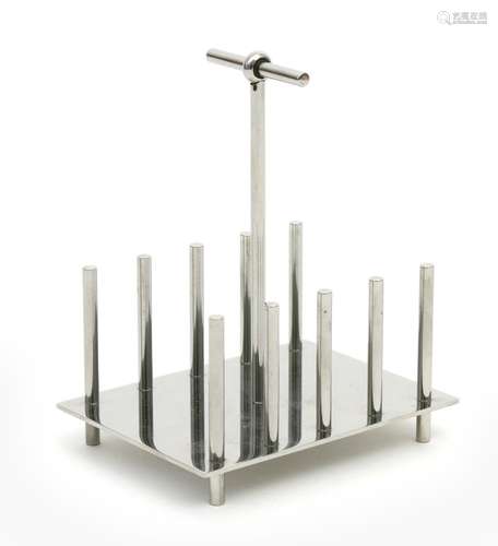 A modern Alessi electroplated toast rack originally designed by Dr Christopher Dresser