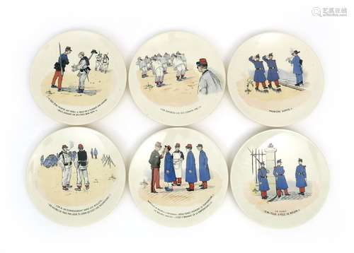 A set of twelve Sarreguemines Mon Regiment  plates after designs by Albert Guillaume