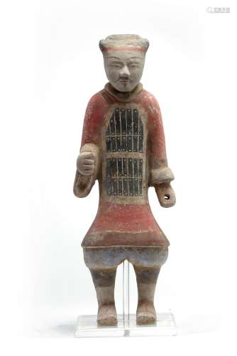 A Chinese painted pottery standing figure of a warrior