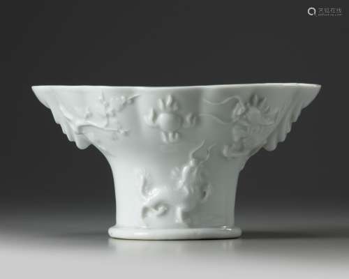 A large Chinese white-glazed libation cup
