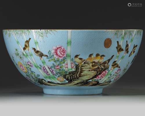 A large Chinese sgraffiato pale-blue-ground famille rose punch bowl