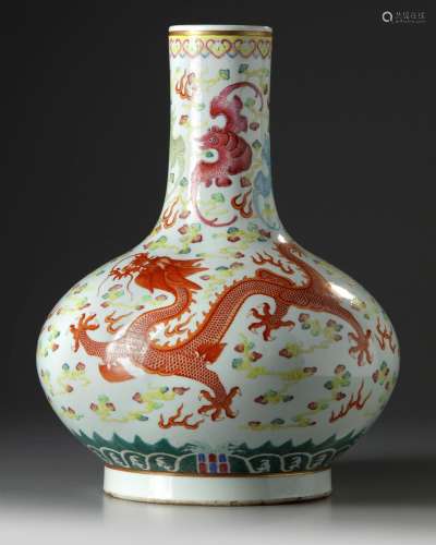 A Chinese famille rose dragon and phoenix bottle vase